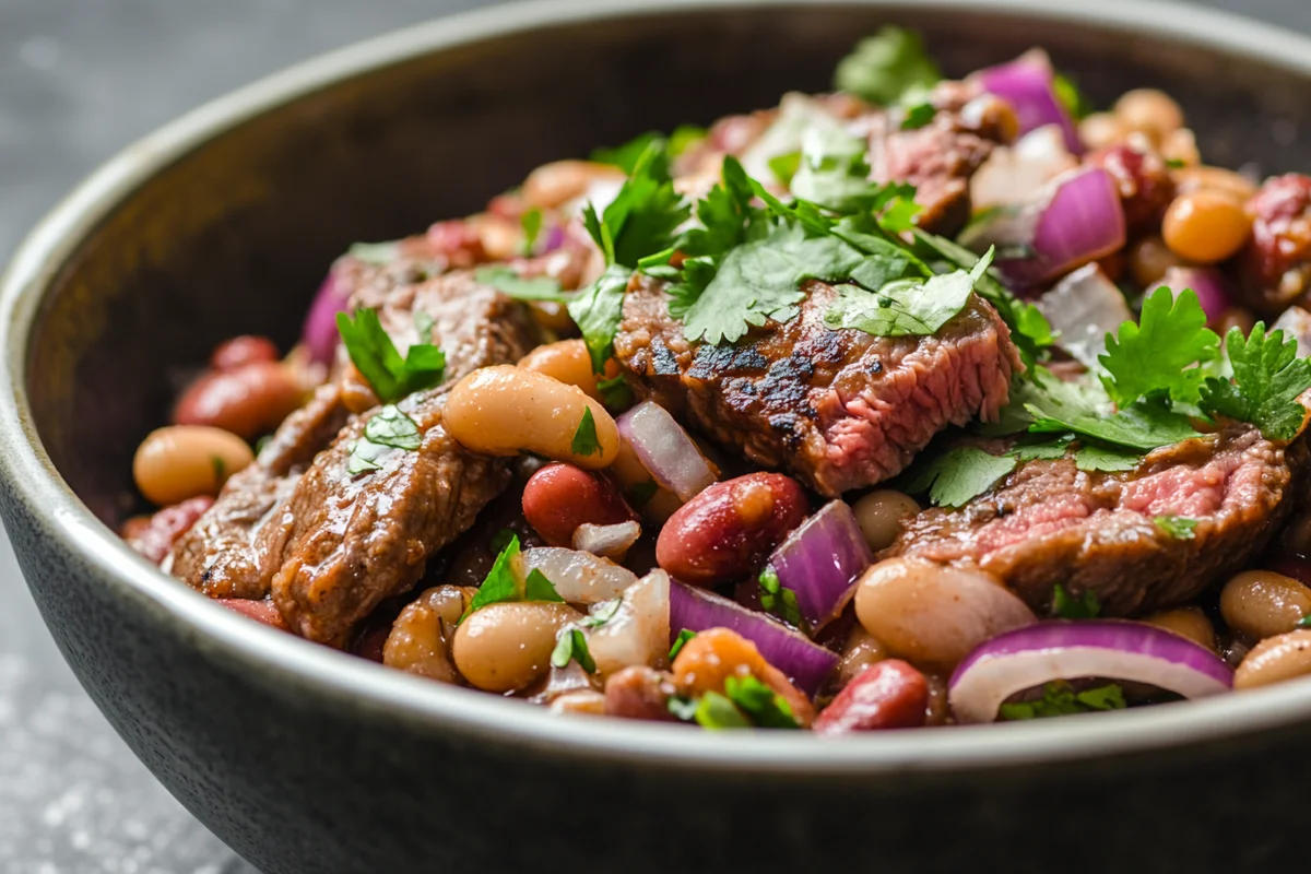 Delicious steak and beans and onions recipe.