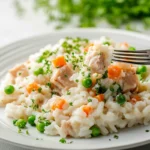 Tuna and rice casserole in a baking dish, golden and bubbly.